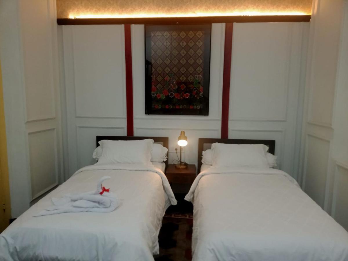 Mruyung Guest House Kota Lama Banyumas Mitra Reddoorz ภายนอก รูปภาพ